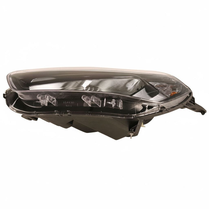 TRANSIT COURIER FRONT N/S HALOGEN HEADLIGHT BLACK SURROUND