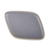 FOCUS FRONT O/S HEADLIGHT WASHER JET COVER