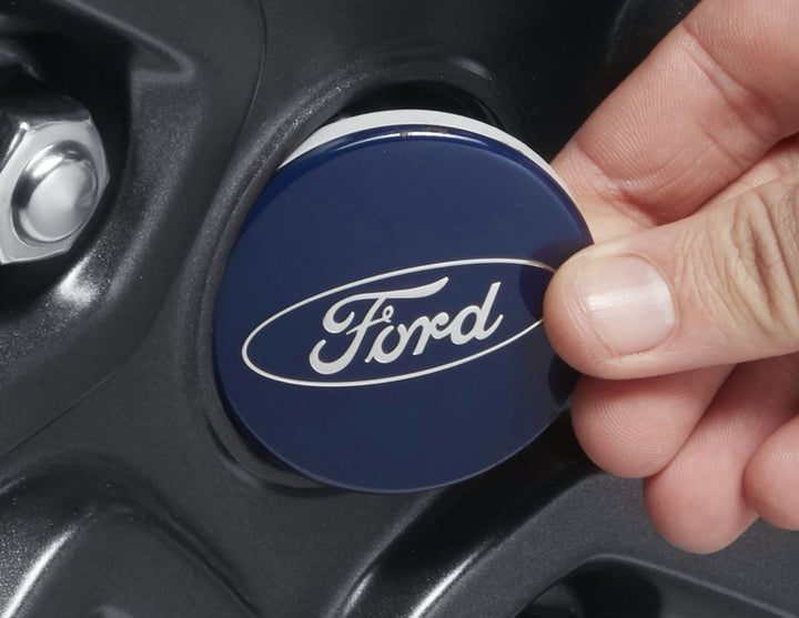 PUMA FOCUS FIESTA SINGLE 54MM ALLOY WHEEL HUB CENTRE CAP FRONT REAR BLUE WITH OVAL LOGO 2003-ONWARDS